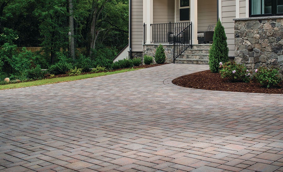 Why Choose Pavers vs Concrete, Stamped or Asphalt Driveways