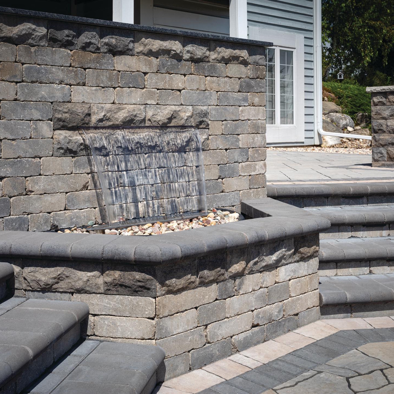 Retaining wall with water feature in new york city