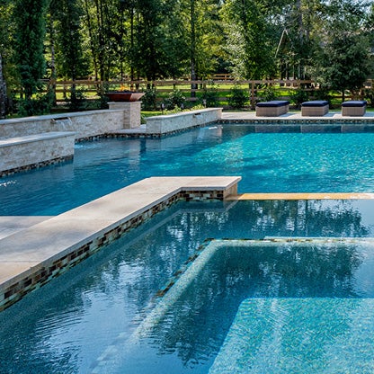 Cool off in a pool with a beautiful PebbleTec® pool finish.