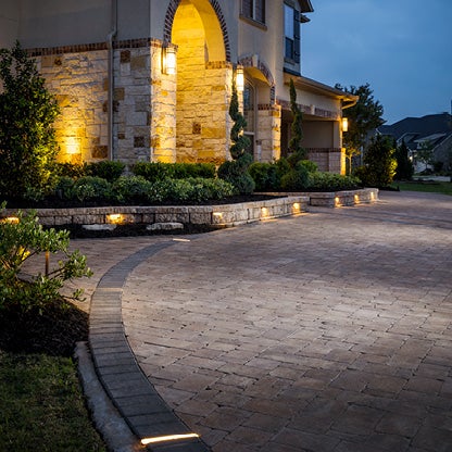 Outdoor driveway featuring Origins Accents by Belgard.