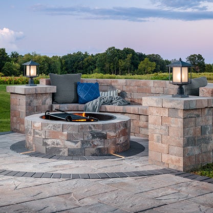 Belgard Outdoor fire-pit with origins accent paver. 